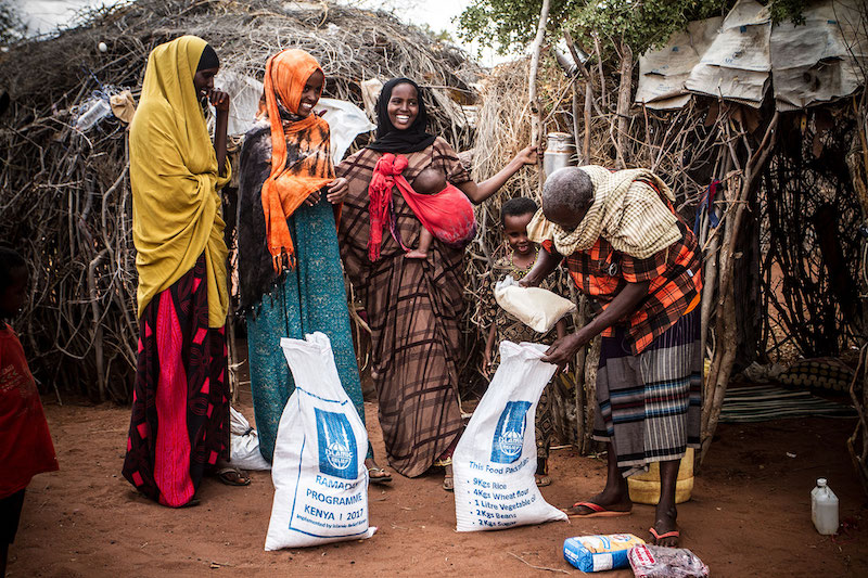 A rural community receiving essential supplies